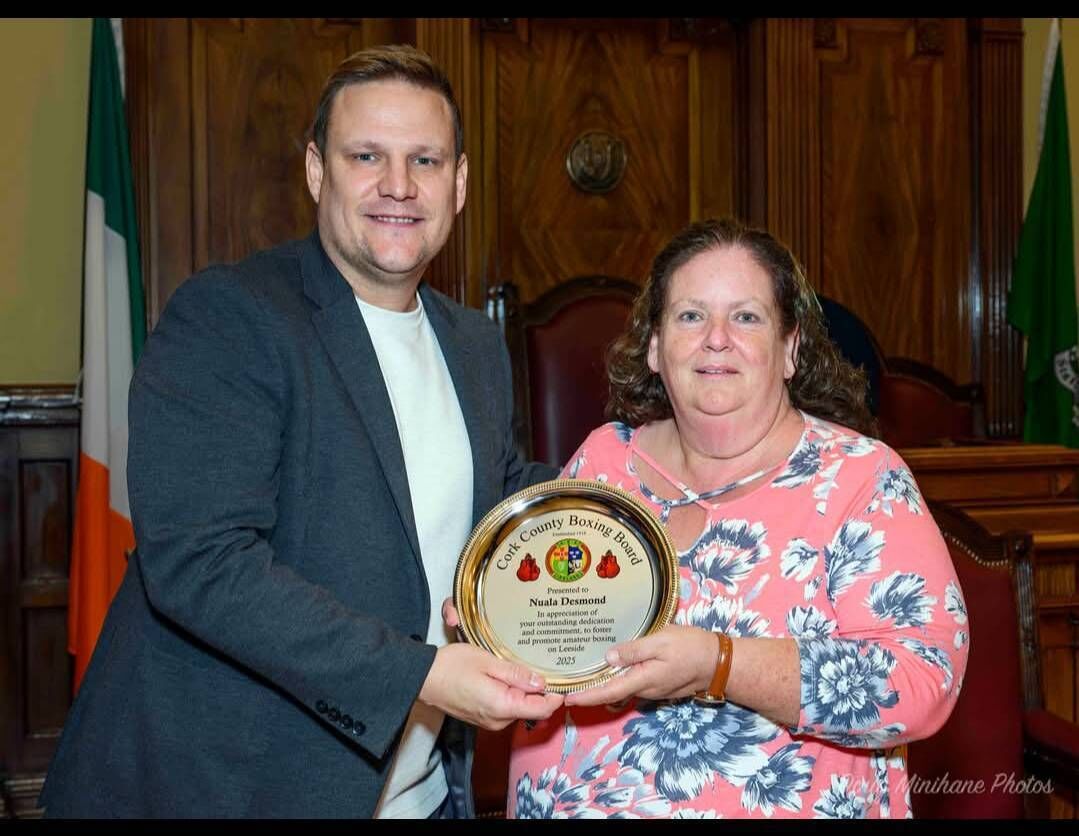 Cork Boxing: Gary Stewart, CEO IABA, making a presentation to Nuala Desmond, Rylane, at Cork City Hall.