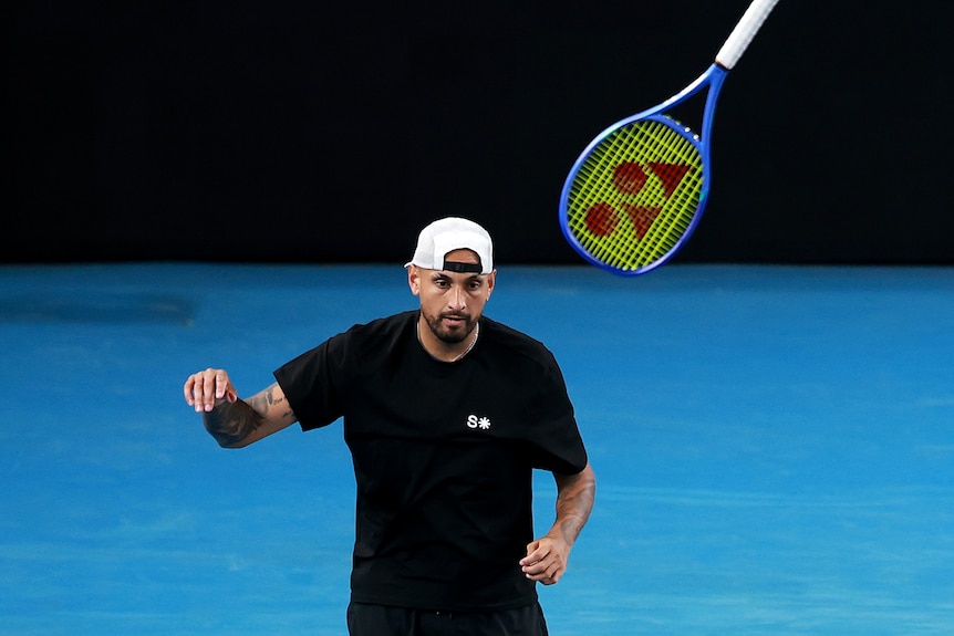 Kyrgios smashing a racquet