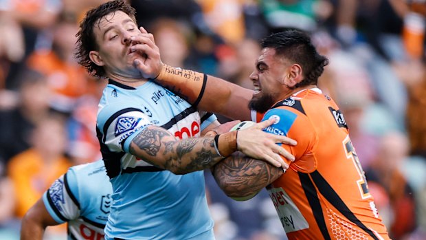 Impact: Royce Hunt takes a carry against his former club the Sharks last year.