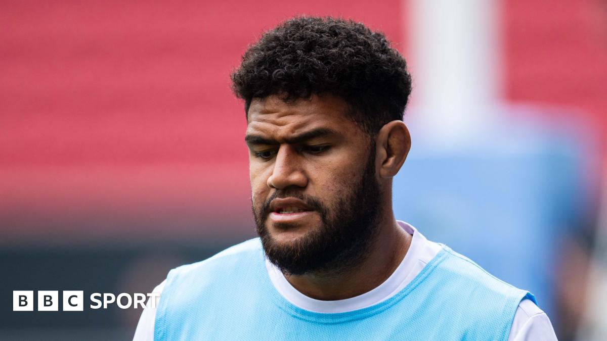 Luke Littler celebrates winning the 2026 PDC World Championship as tickertape falls