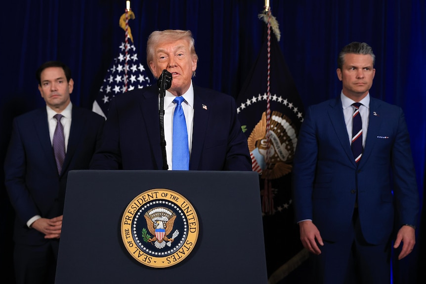 Donald Trump is flanked by Marco Rubio and Pete Hegseth.