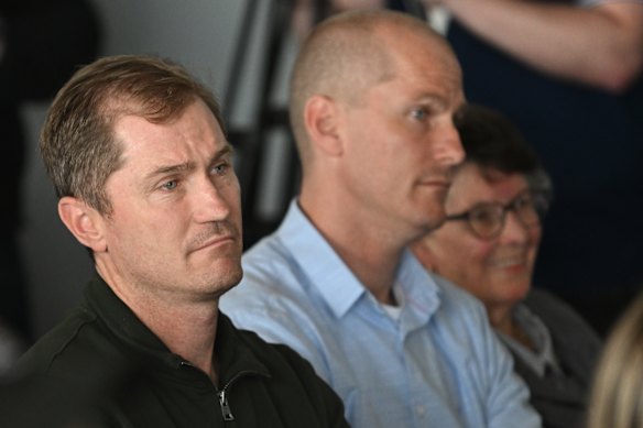 Adam Selwood and Troy Selwood look on as their brother Joel  announces his retirement in 2022.