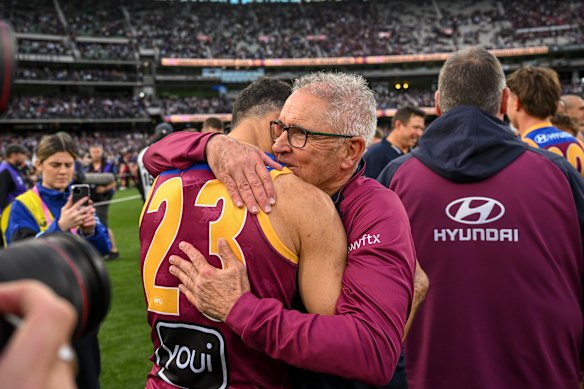 Chris Fagan hugs his star small forward, Charlie Cameron.