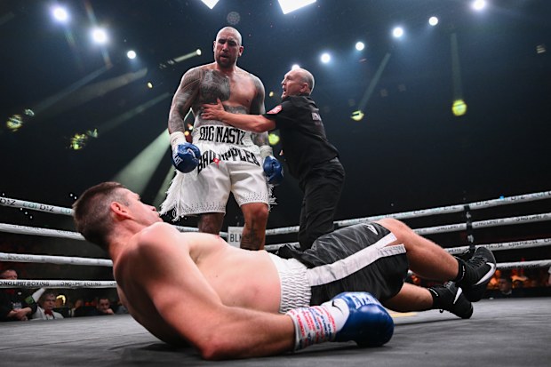 Nelson Asofa-Solomona standing over Jeremy Latimore after his brutal knockout.