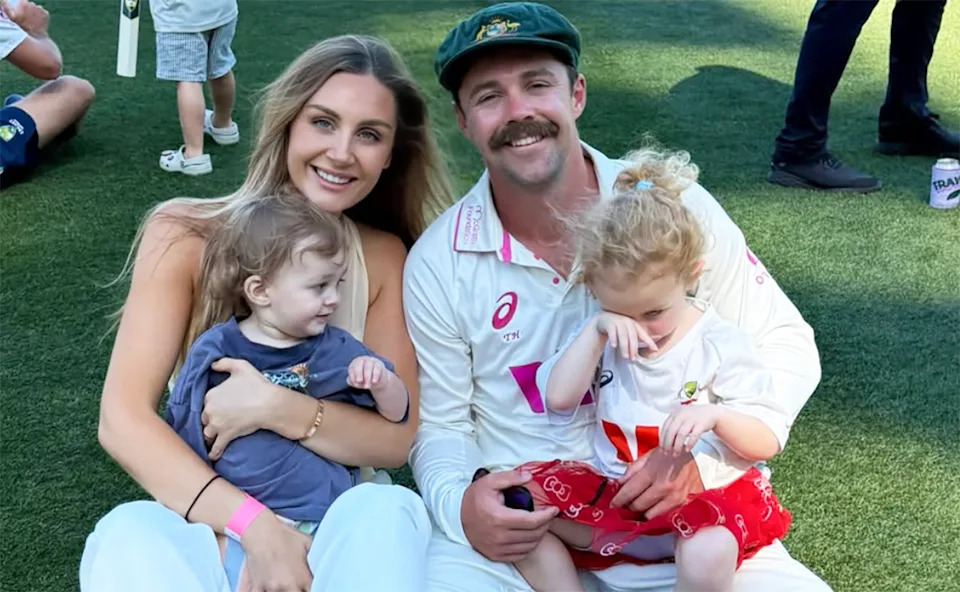 Travis Head with wife Jess and their two kids.