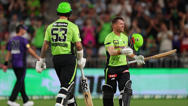 David Warner of the Thunder celebrates scoring a century.