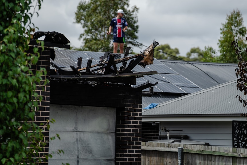 Firefighter on roof Spring Fram fire 030125