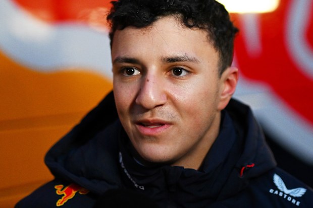 Isack Hadjar of France and Oracle Red Bull Racing is interviewed during day one of F1 Shakedown at Circuit de Catalunya on January 26, 2026 in Montmelo, Spain. (Photo by Rudy Carezzevoli/Getty Images)