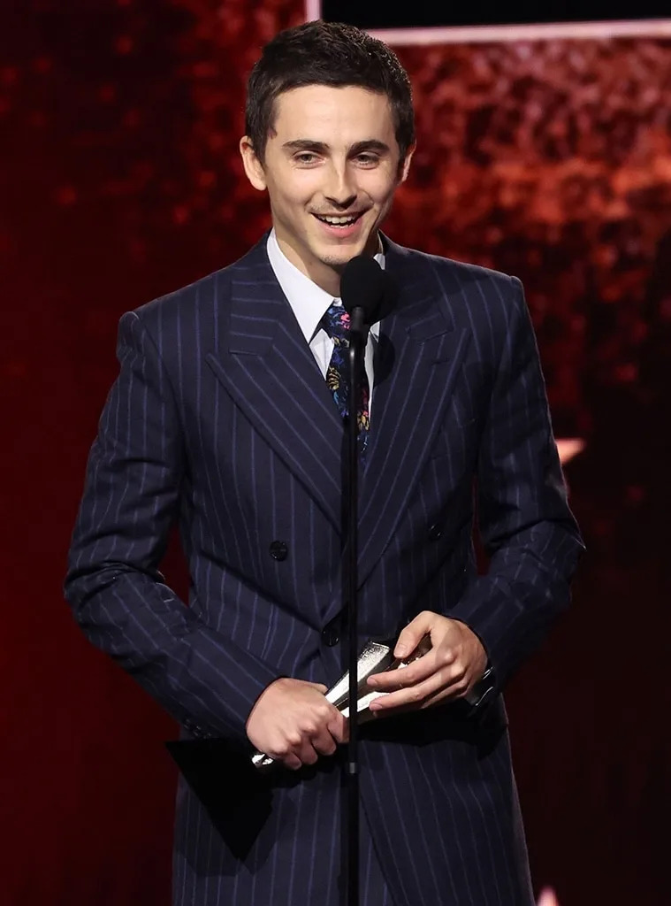 Timothée Chalamet accepts the trophy for Best Actor at the 2026 Critics Choice Awards