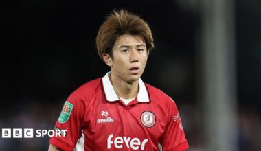 Yu Hirakawa playing in a red shirt for Bristol City in August earlier this season
