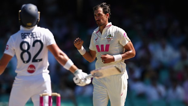 Mitchell Starc of Australia celebrates dismissing Jacob Bethell of England.