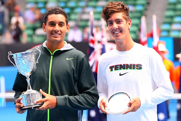 Nick Kyrgios (L) of Australia celebrates with the championship trophy and Thanasi Kokkinakis of Australia with the runners up plate after their junior boys' final match during the 2013 Australian Open Junior Championships at Melbourne Park on January 26, 2013 in Melbourne, Australia. (Photo by Ryan Pierse/Getty Images)