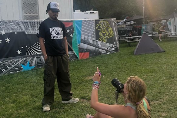 Richardson photographing Chance the Rapper at Lollapalooza music festival in Chicago in 2025.