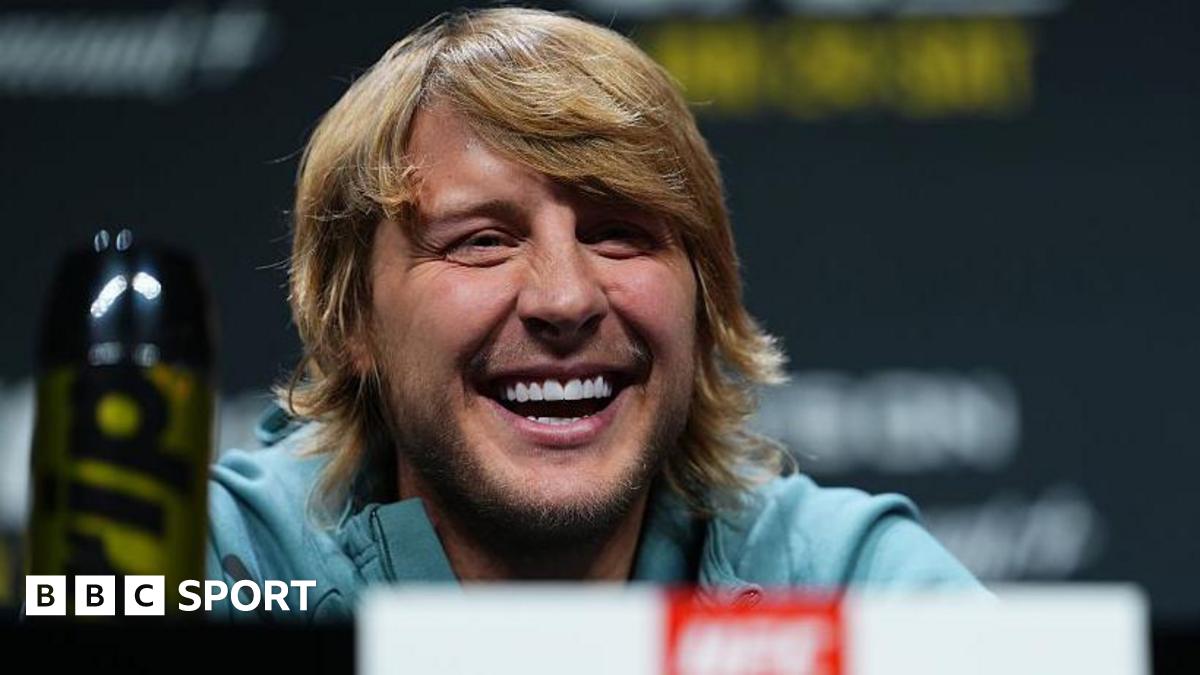 Paddy Pimblett laughs at a news conference