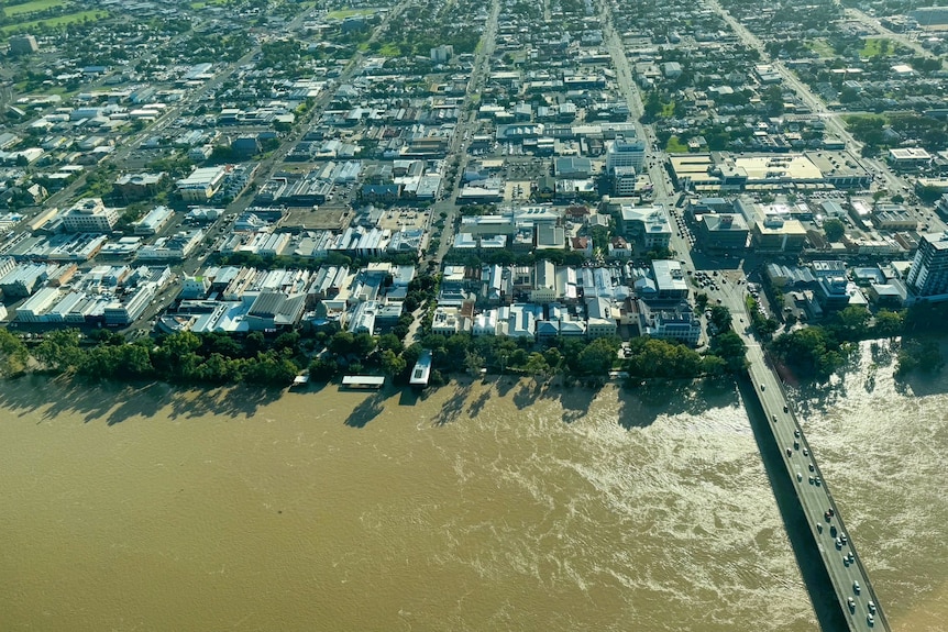 Drone shot of a river and houses