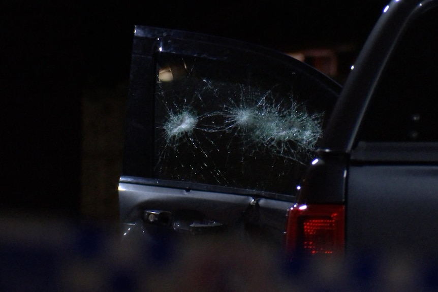 A smashed car window.