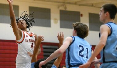 La Academia boys basketball player, out with a football injury, continues his road to recovery | Boys' basketball