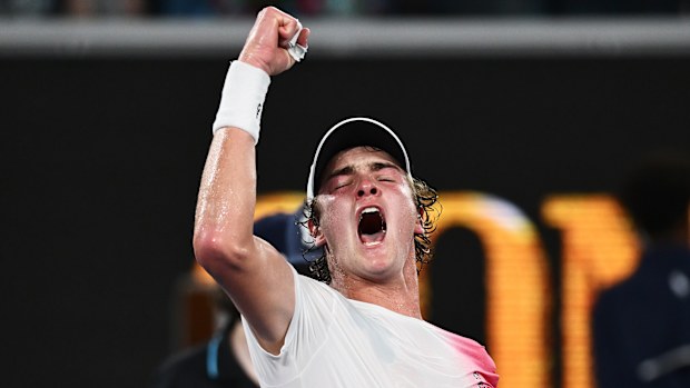Joao Fonseca of Brazil celebrates winning match point against Andrey Rublev.