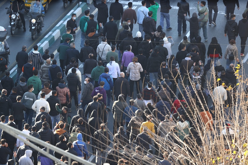 Protesters march in downtown Tehran, Iran.