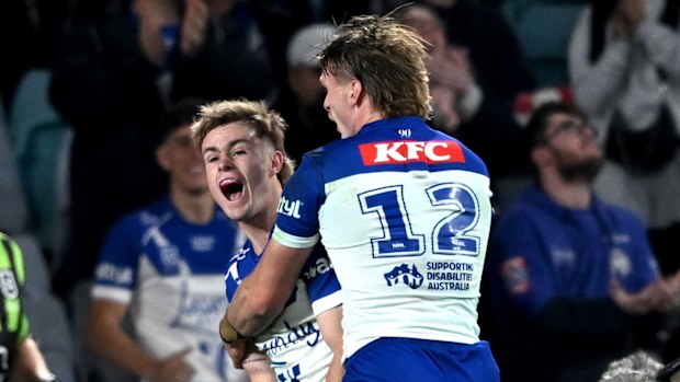 Lachlan Galvin celebrates scoring a try