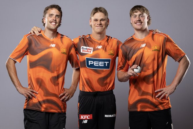Tom McCarthy and Harley Reid of the West Coast Eagles pose with Cooper Connolly during a Perth Scorchers 2025-26 BBL Headshots Session on December 10, 2025, in Perth.
