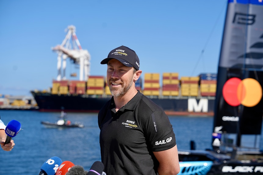 SailGP racer Kinley Fowler speaks to media in Fremantle Harbour.