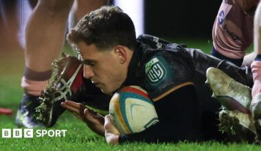 Ospreys scrum-half Kieran Hardy crosses for a try against Cardiff