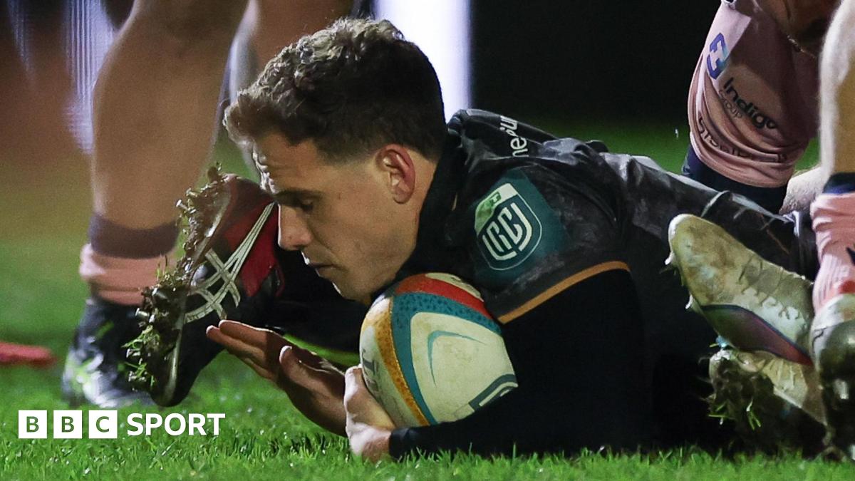 Ospreys scrum-half Kieran Hardy crosses for a try against Cardiff