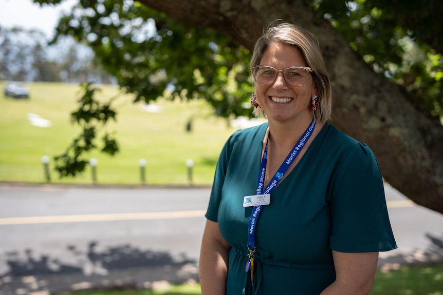 Emily Sass standing outside.