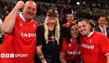 Sam Wainwright (right) with his family after Wales' 2022 win in South Africa