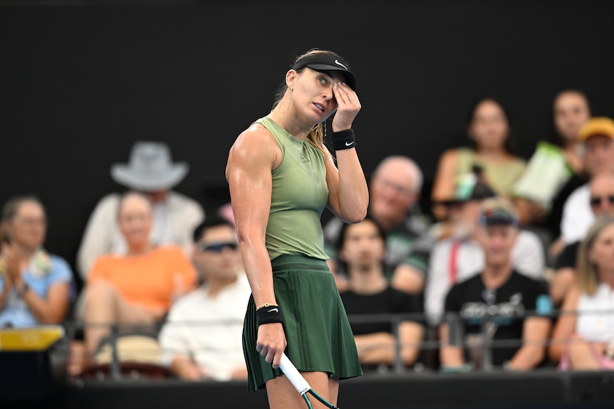 Paula Badosa looking defeating on court at the Brisbane International