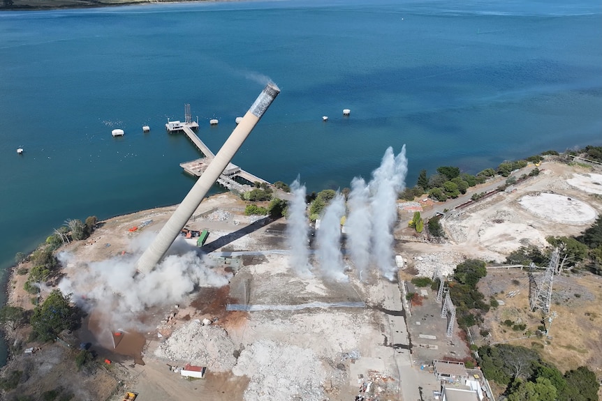 Smokestack at Bell Bay power station is demolished by explosives.