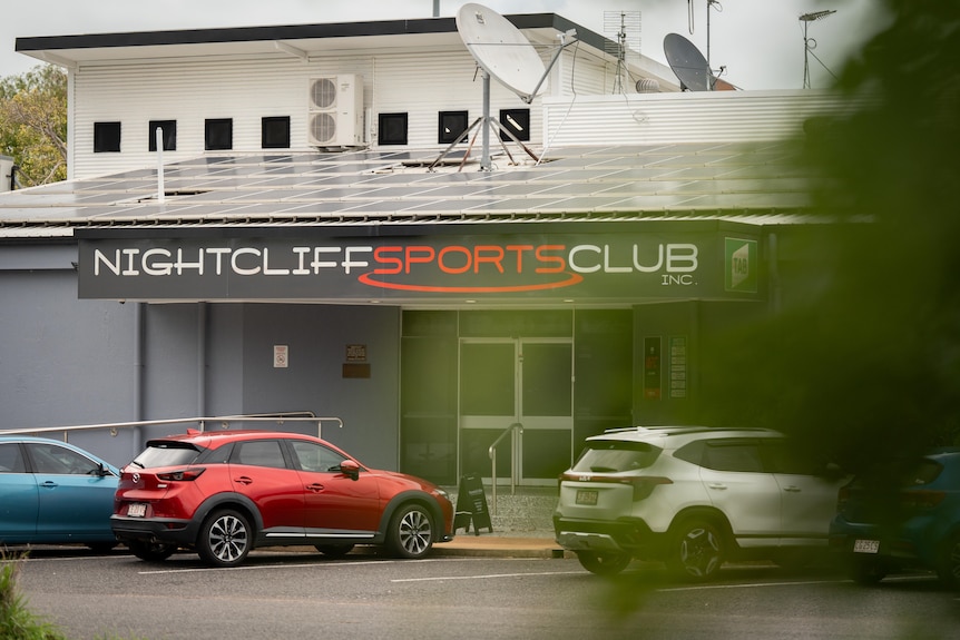 Cars parked outside a club