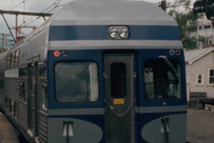 The front of a blue commuter train