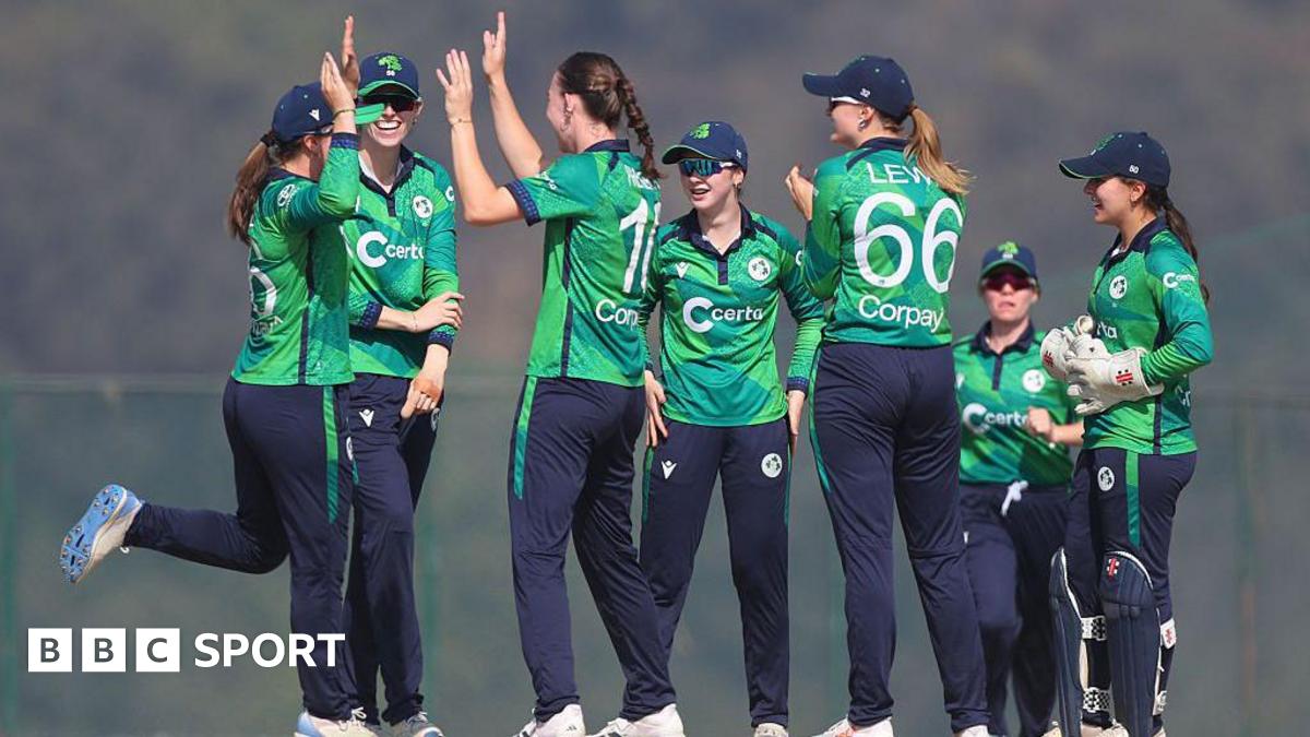A group of Ireland players celebrate their win over the Netherlands in Nepal