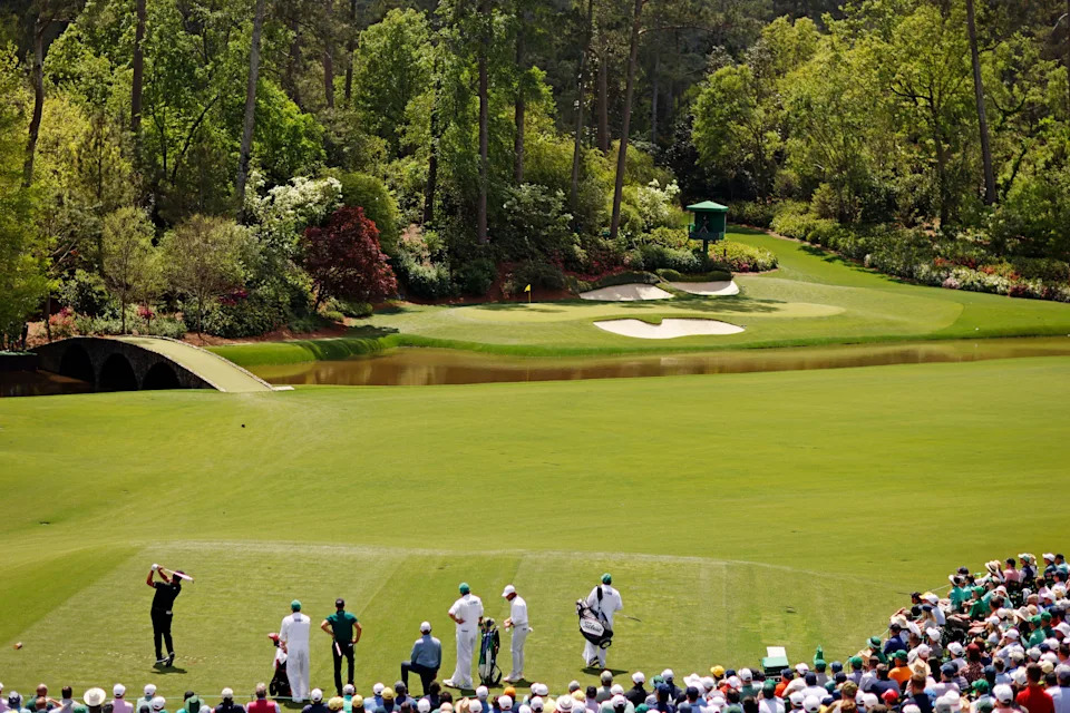 Jon Rahm plays his shot from the 12th tee during the second round of the Masters Tournament at Augusta National Golf Club.