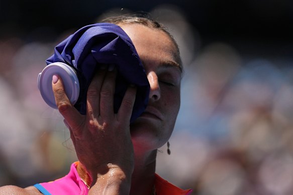 Aryna Sabalenka uses an ice pack.
