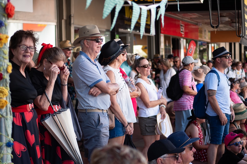People singing and dancing at the Parkes Elvis Festival.