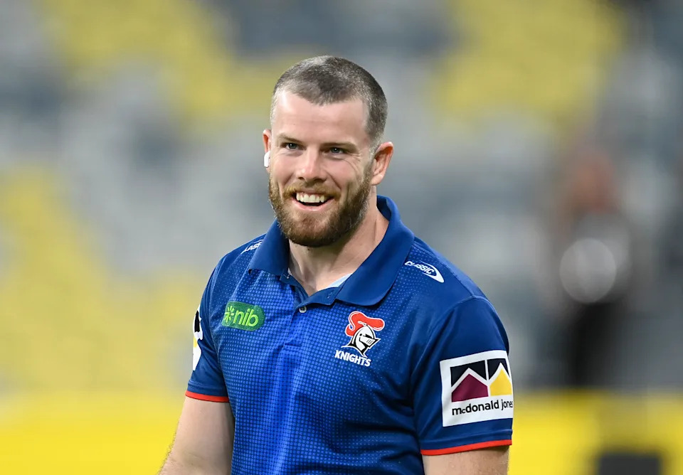 Lachlan Fitzgibbon looks on before the start of a game.