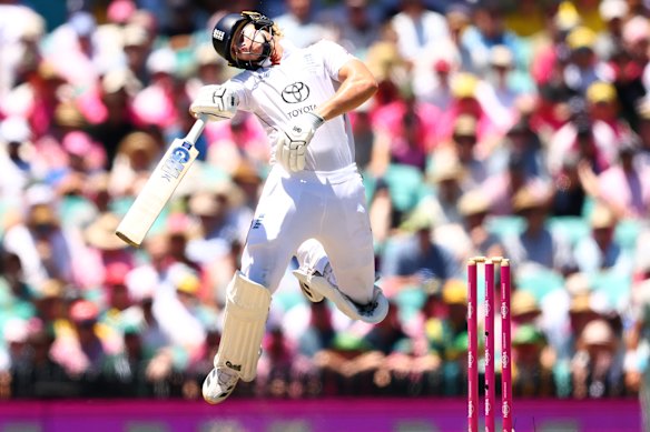 Jacob Bethell is hit on the helmet by a delivery from Cameron Green.