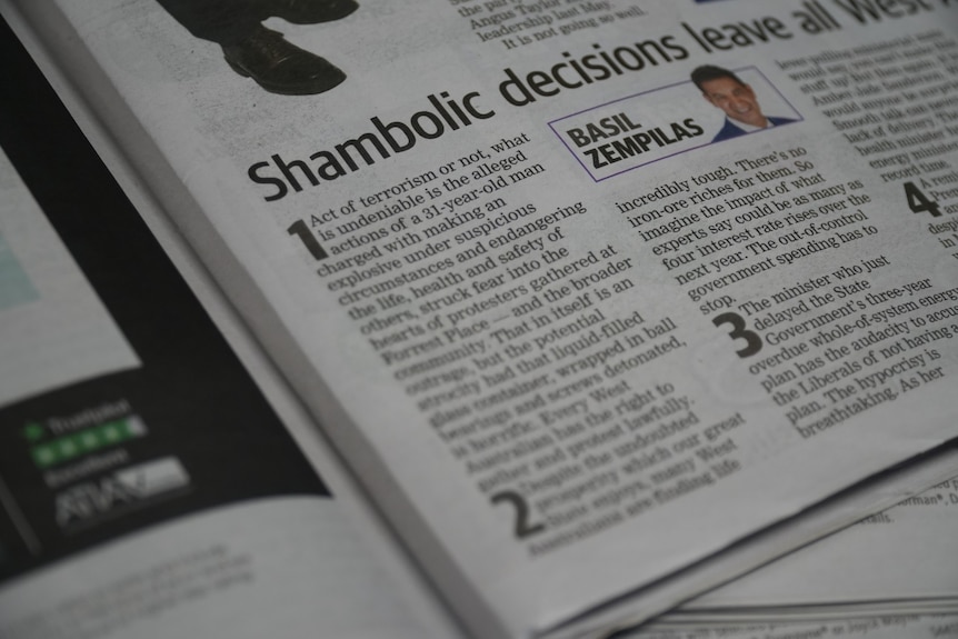 A newspaper laid out on a table