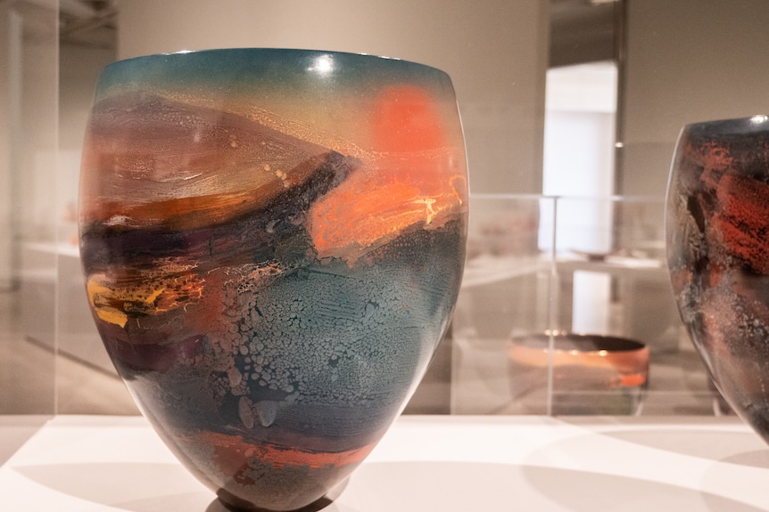 Piece of glazed porcelain in soft, rich colours