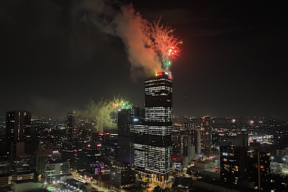 Fireworks erupt off the tower of 6-8 Parramatta Square on New Year’s Eve, 2025.