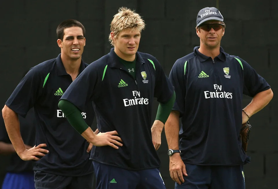 Mitchell Johnson and Shane Watson with bowling coach Troy Cooley.