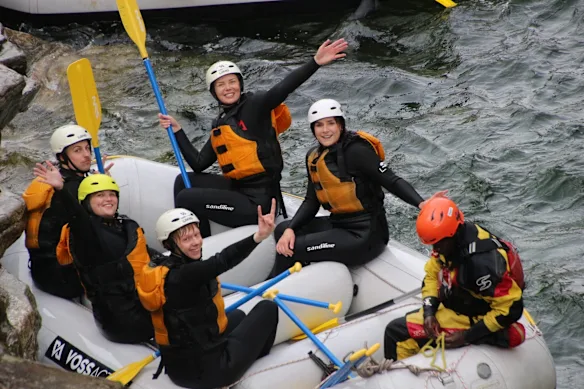 Katie Berridge, in the yellow helmet, on a white-water rafting tour in Voss, Norway in September 2025.