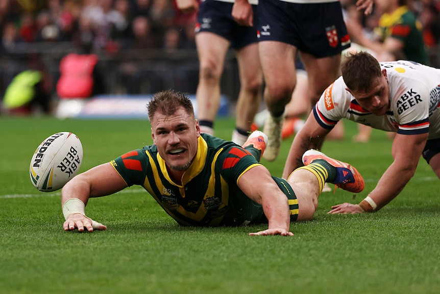 Angus Crichton scores a try