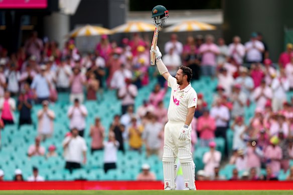 Travis Head celebrates his century.