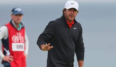 Brooks Koepka, of the United States, acknowledges the crowd on the 5th green during the first round of the British Open golf championship at the Royal Portrush Golf Club in Northern Ireland, July 17, 2025. (AP Photo/Peter Morrison)