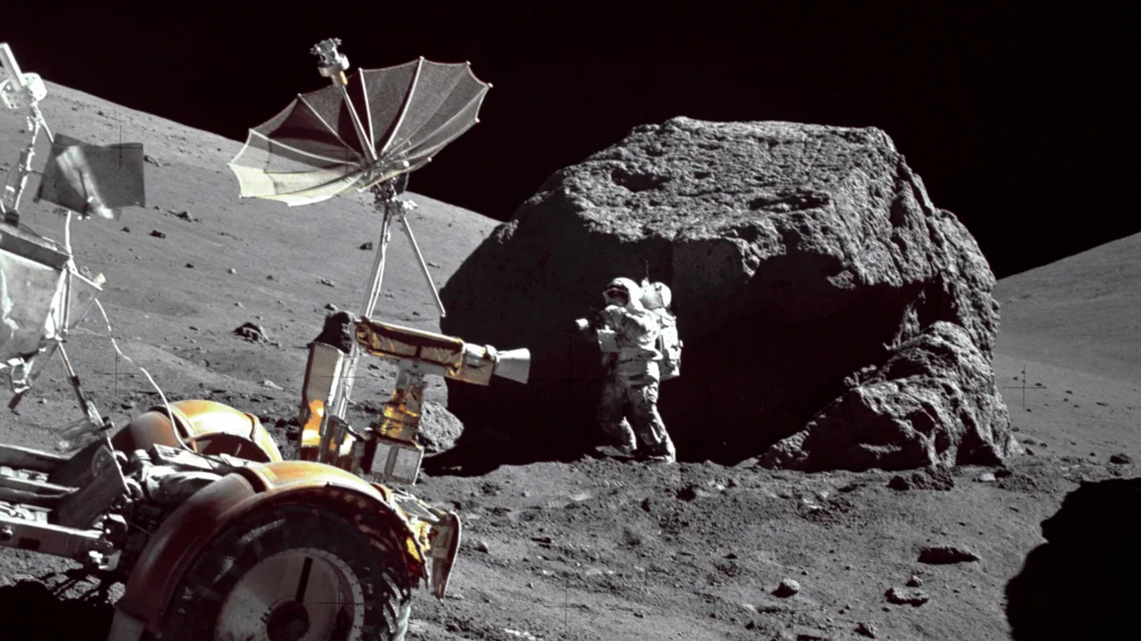 Photo of Apollo astronauts collecting samples on the moon