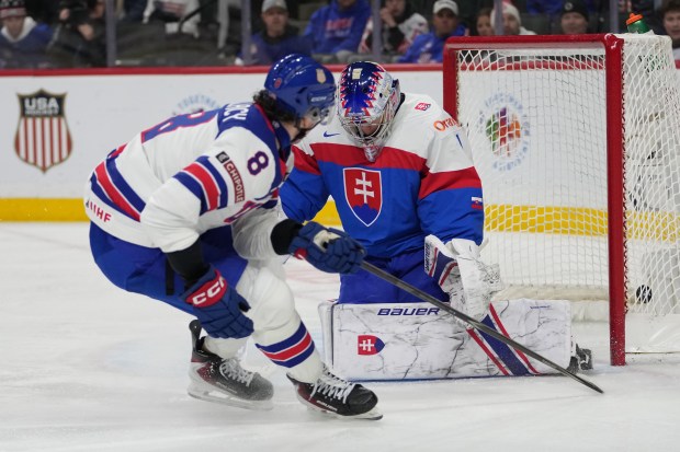 U.S. forward Aj Spellacy scores past Slovakia goalie Michal Pradel during the second period at the IIHF World Junior Hockey Championship on Dec. 29, 2025, in St. Paul, Minn. (Abbie Parr/AP)